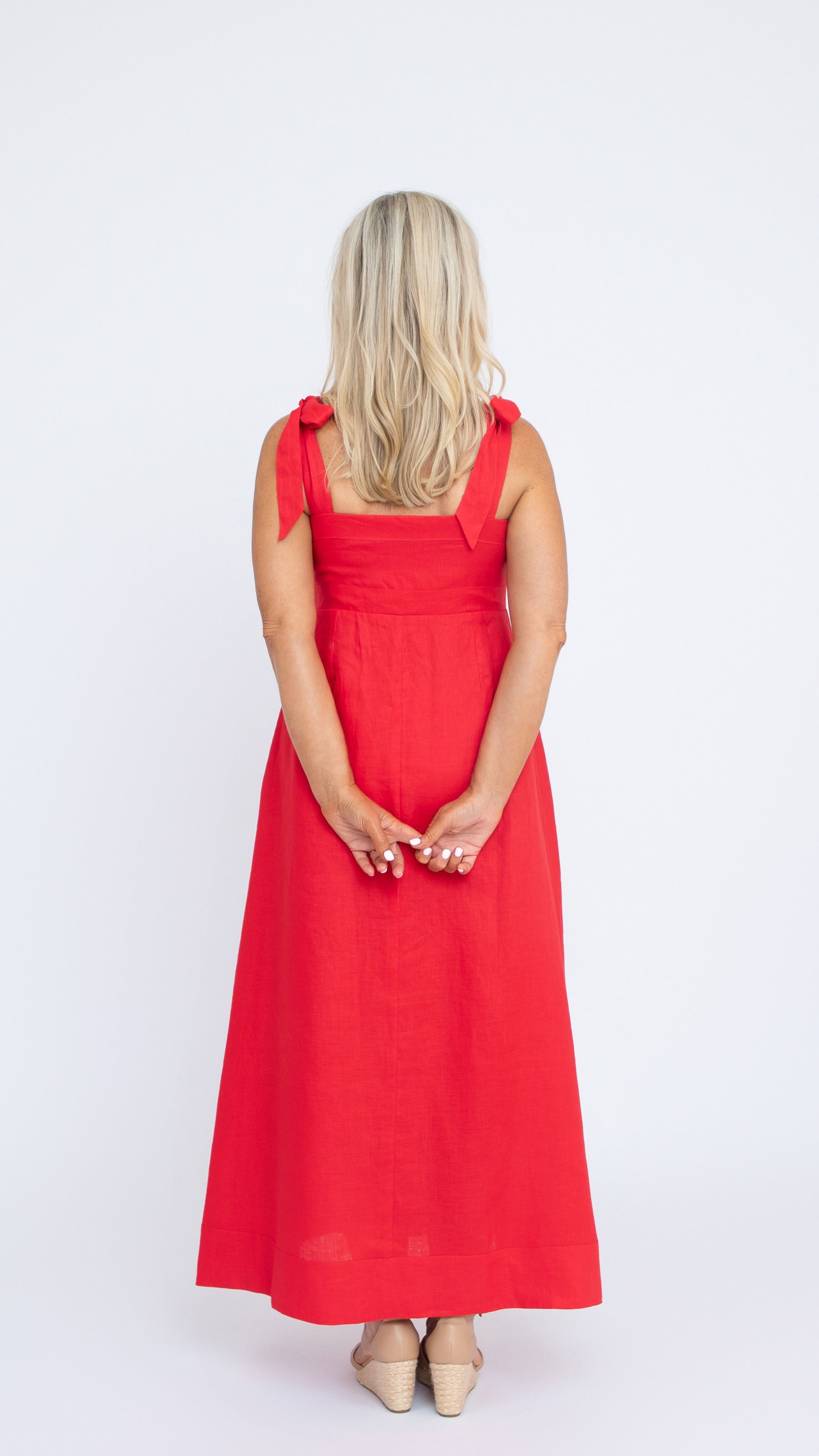 Isabelle Linen Dress in Crimson Red by Nancy The Label. Full length linen dress with square neckline and self-tie straps. Back view.