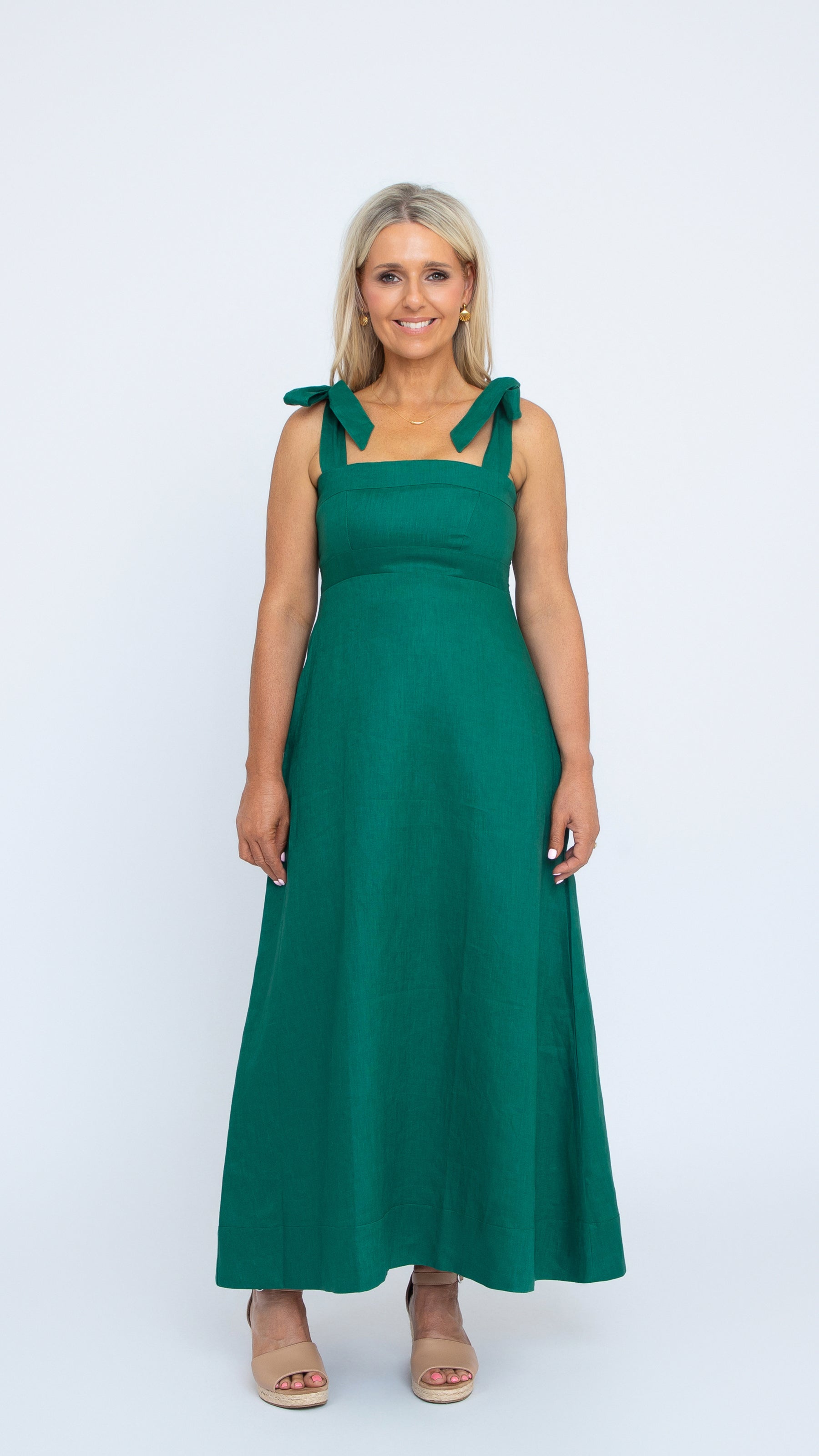 Isabelle Linen Dress in Emerald Green by Nancy The Label. Full length linen dress with square neckline and self-tie straps.