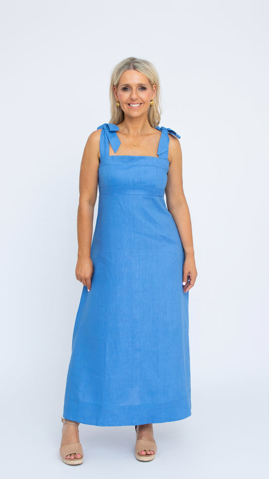 Isabelle Linen Dress in Dazzling Blue by Nancy The Label. Full length linen dress with square neckline and tie straps.