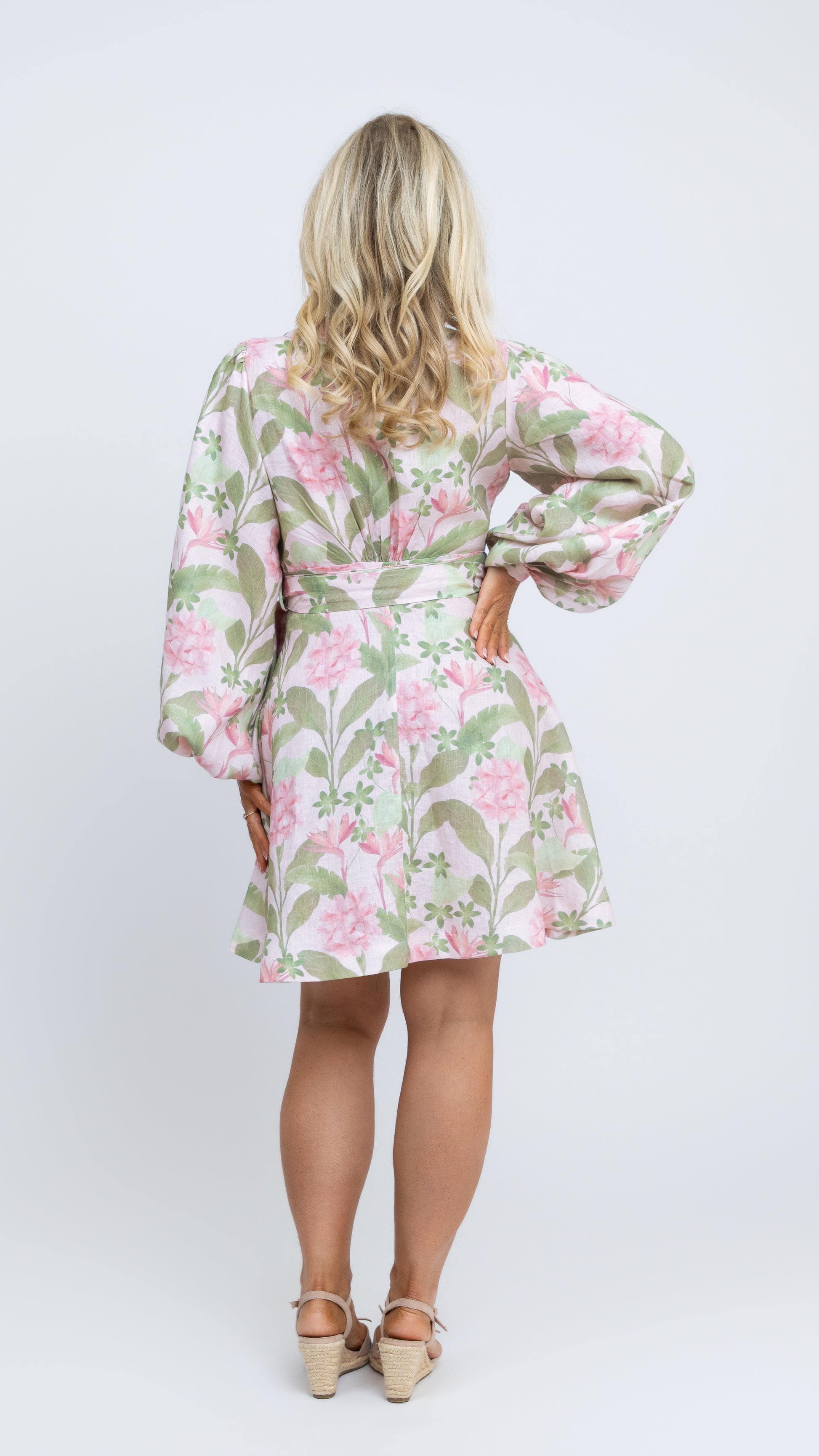 The back view of our Margot Linen Mini Wrap Dress in our bespoke Tropical Botanica print